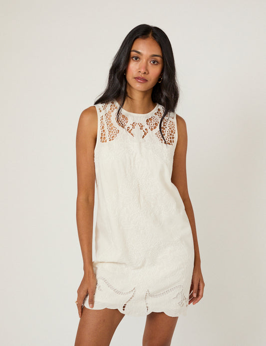 omika sleeveless embroidered mini dress The Adi Mini dress by OMIKA is your new casual-cool mini dress with charming warm weather vibes! Shop this look today!