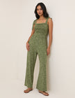 Green Polka Dot Tie Shoulder Jersey Jumpsuit