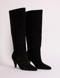 Black suede knee-high boots with cone heels