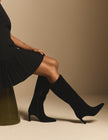 Black suede pointed toe knee-high boots