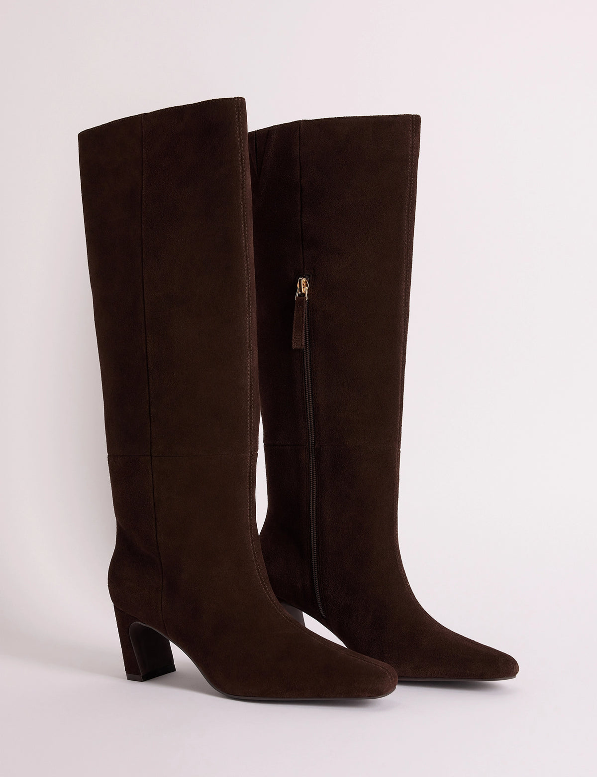 Brown suede knee-high boots with pointed toe