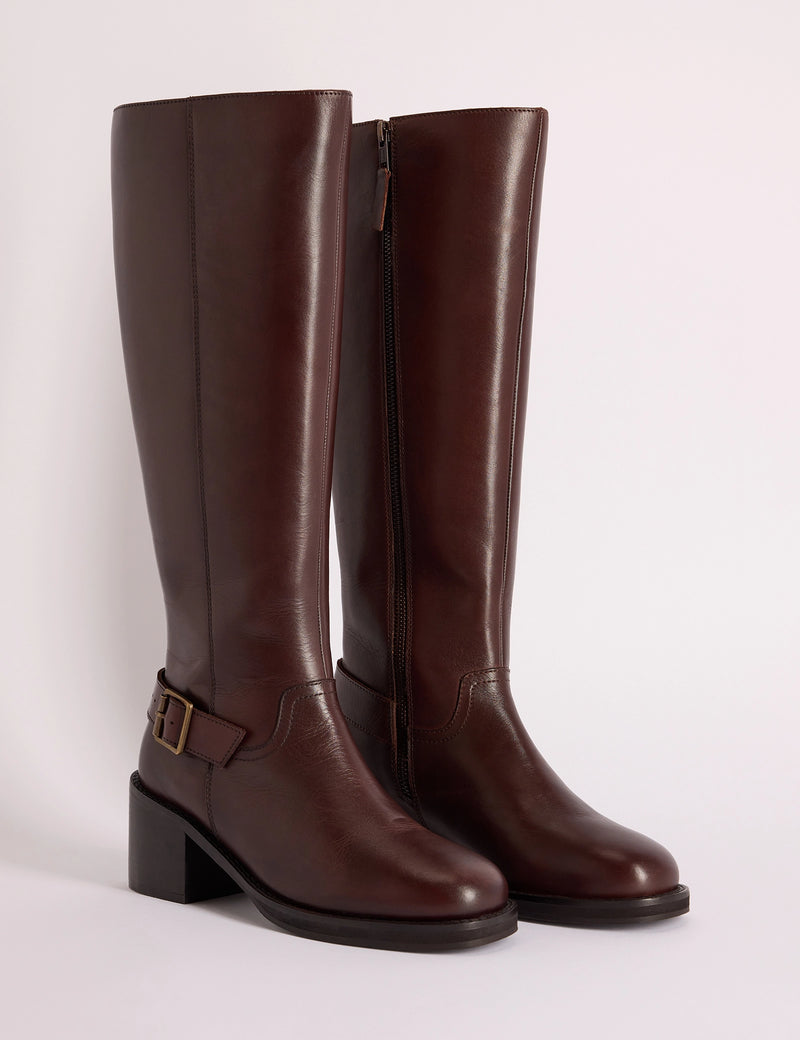 Brown leather knee-high boots with buckle detail