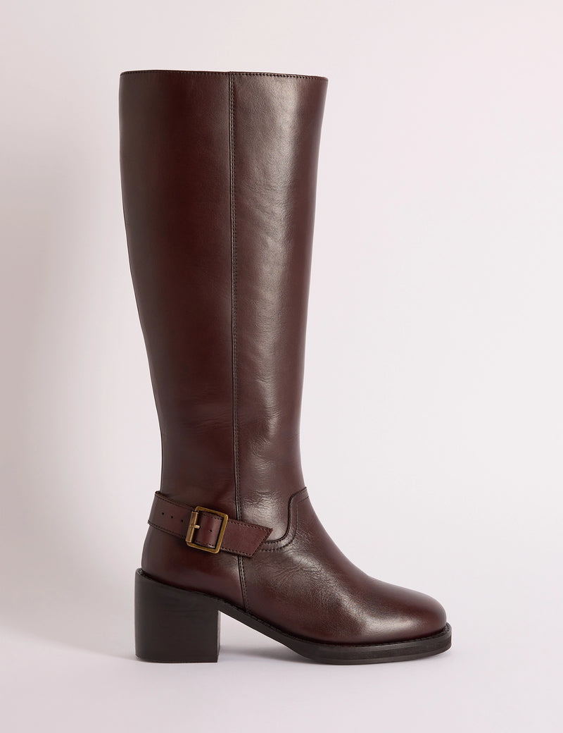 Side view of brown leather buckle knee-high boot
