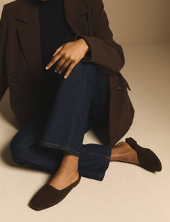Chocolate brown suede ballet mules worn with jeans