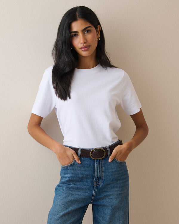 Brown leather belt with gold-toned oval buckle