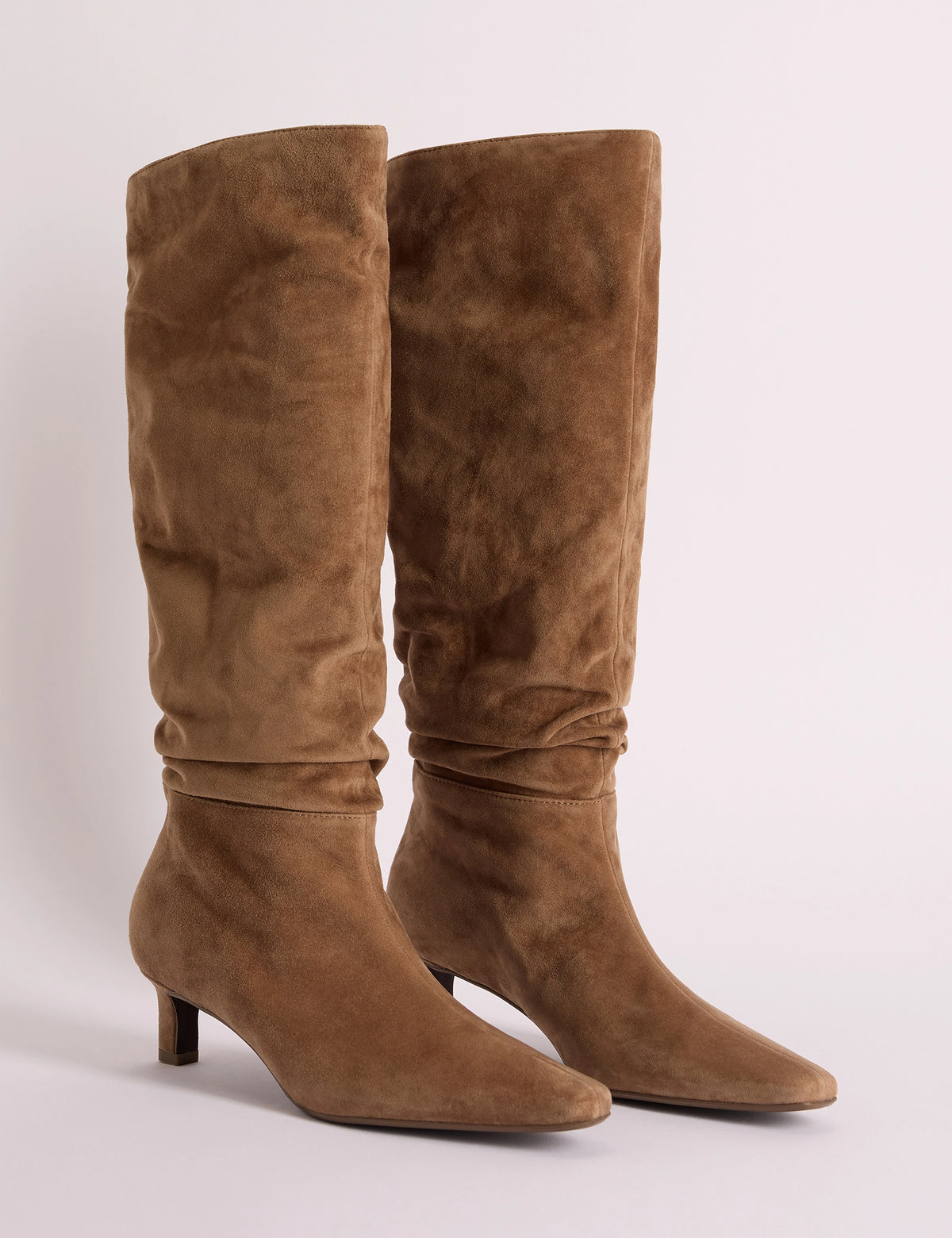 Tan slouch knee-high boots with kitten heel