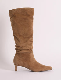Side view of tan suede slouch knee-high boot