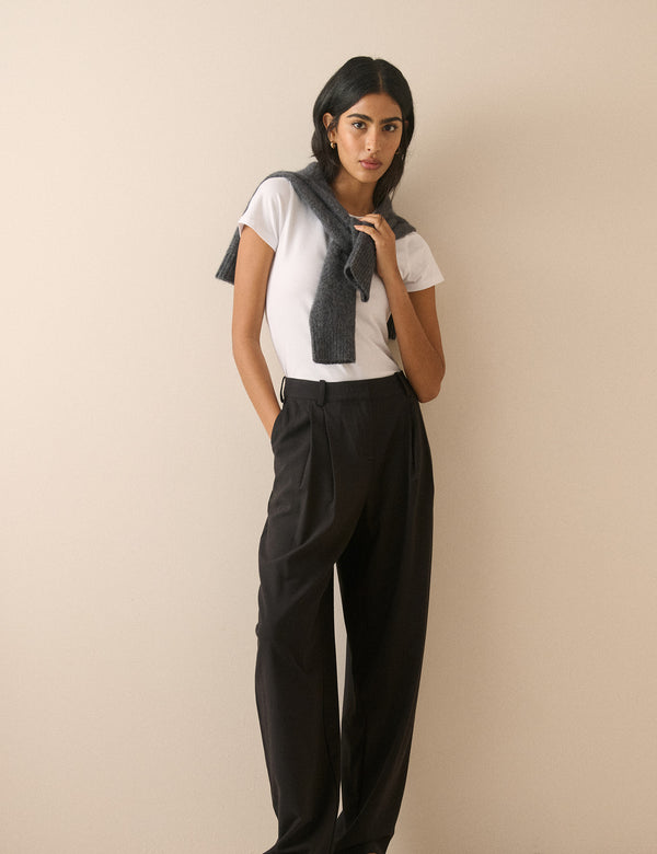 Black tailored barrel leg trousers