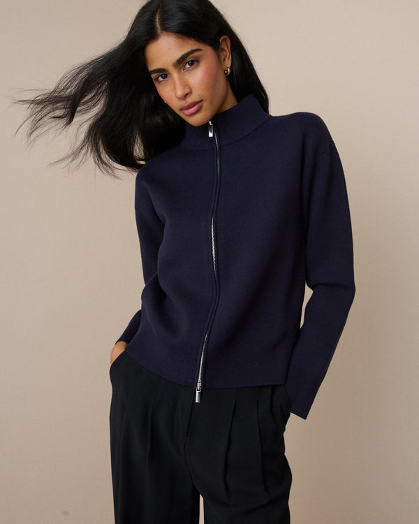 Navy high neck zip-through knitted jacket