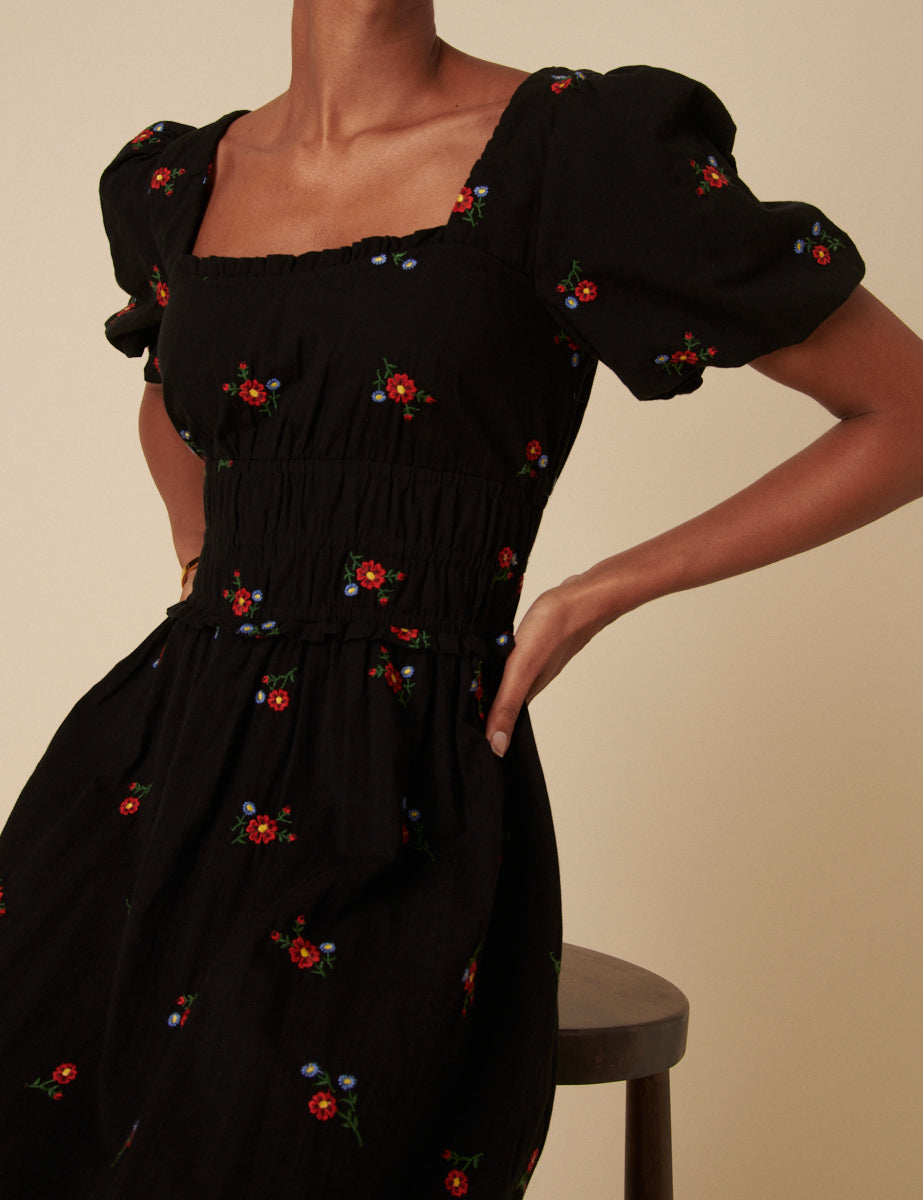 black dress with embroidered flowers Diana Floral 100% Polyester 100% Recycled polyester lining Concealed zip at centre back Made in China Embroidered Black plus size dress