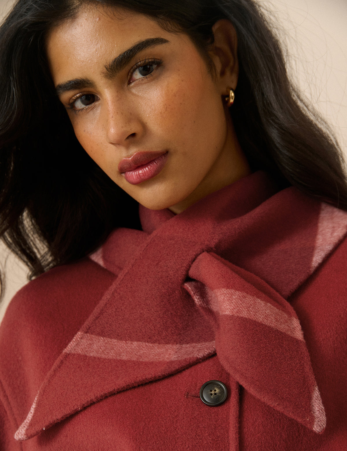 Tie neck detail on red wool-blend jacket