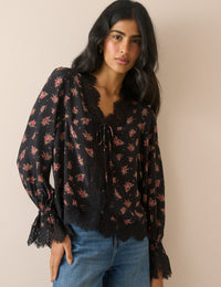 Black floral satin blouse with lace trim