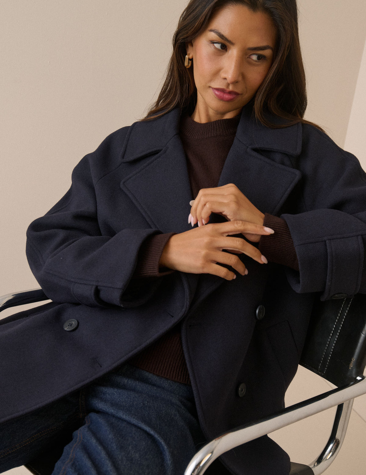 Oversized collar detail on navy wool-blend pea coat