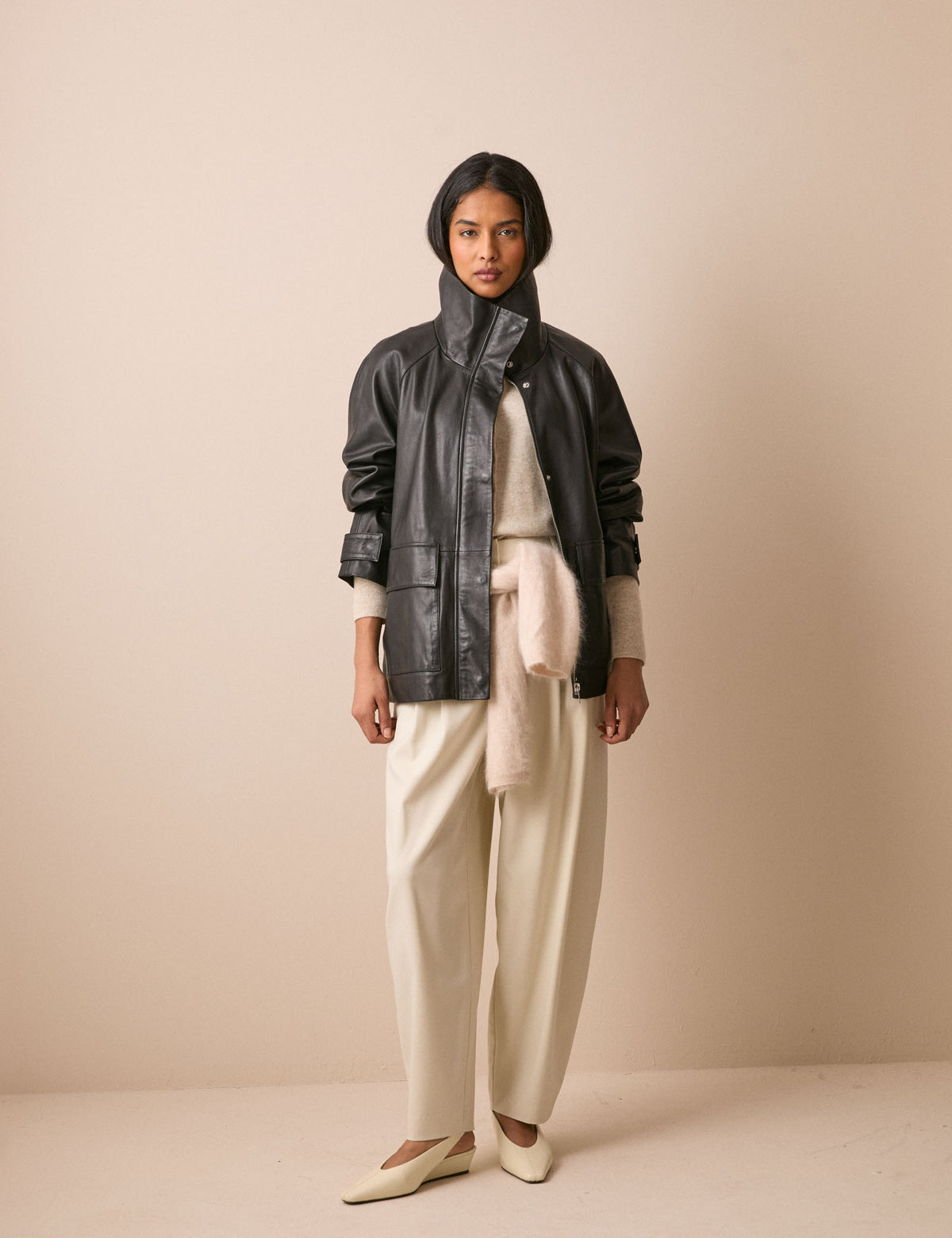 Black leather funnel neck jacket