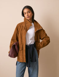 Front view of tan suede funnel neck jacket