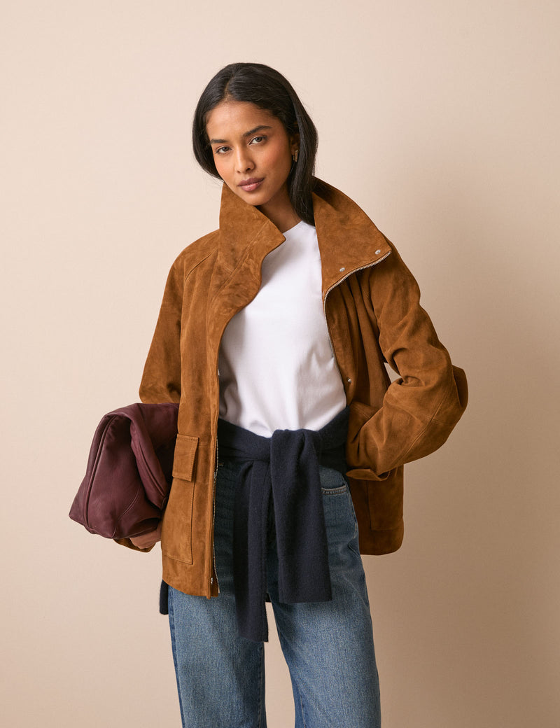 Front view of tan suede funnel neck jacket