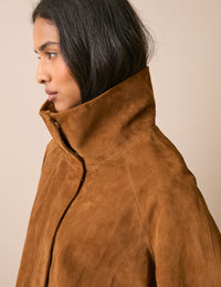 Funnel neck detail on tan suede jacket
