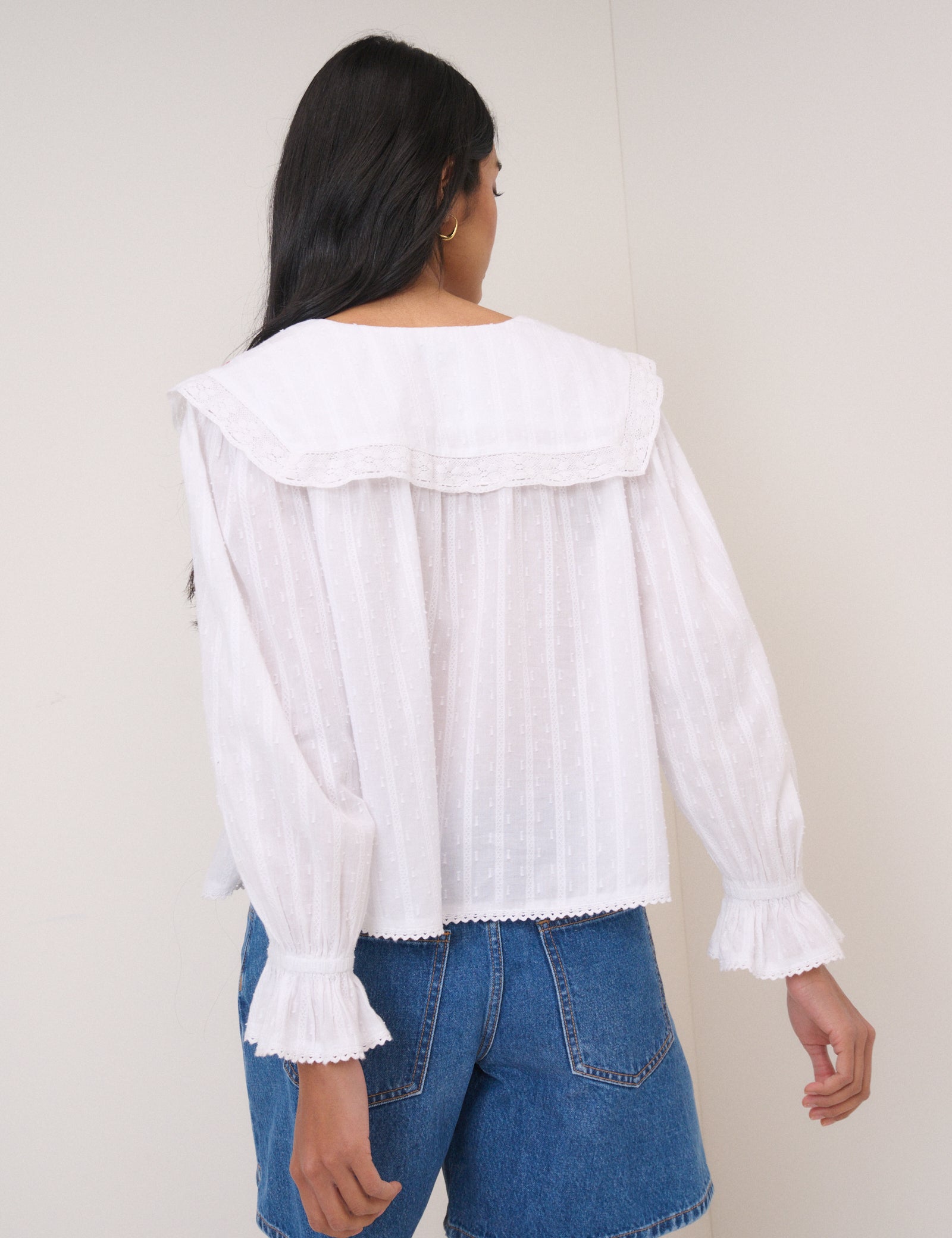 A White Embroidered Blouse Works With Every Pair Of Jeans In 2025 A White Embroidered Blouse Works With Every Pair Of Jeans In 2025