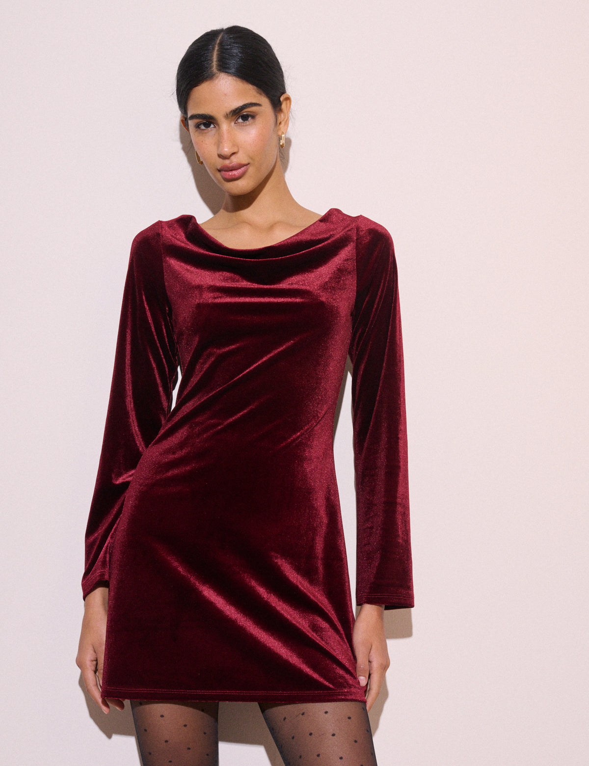 Burgundy velvet cowl neck mini dress with long sleeves
