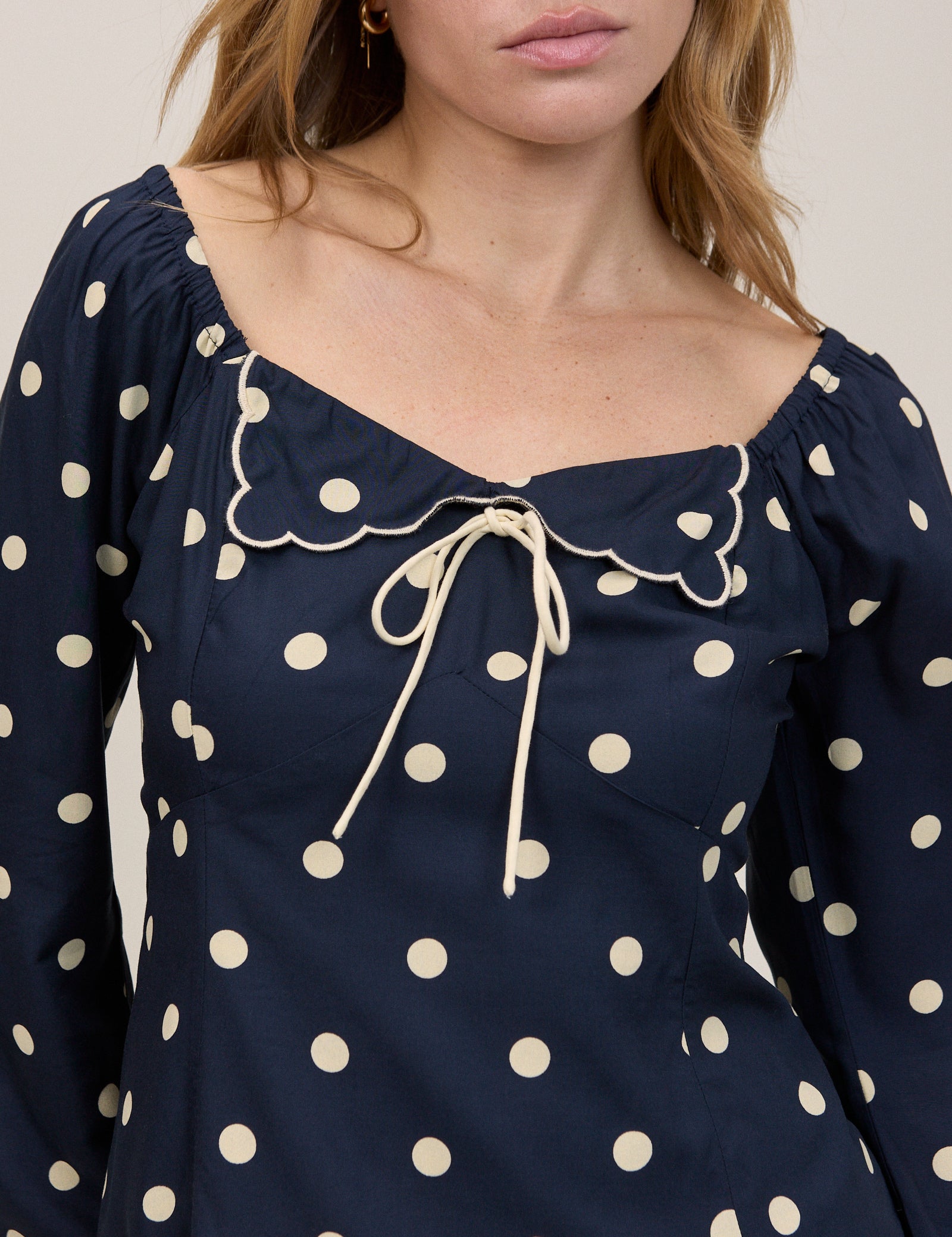 Navy Polka Bow Top