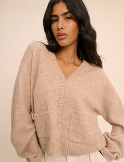 Beige knitted V-neck cardigan with patch pockets