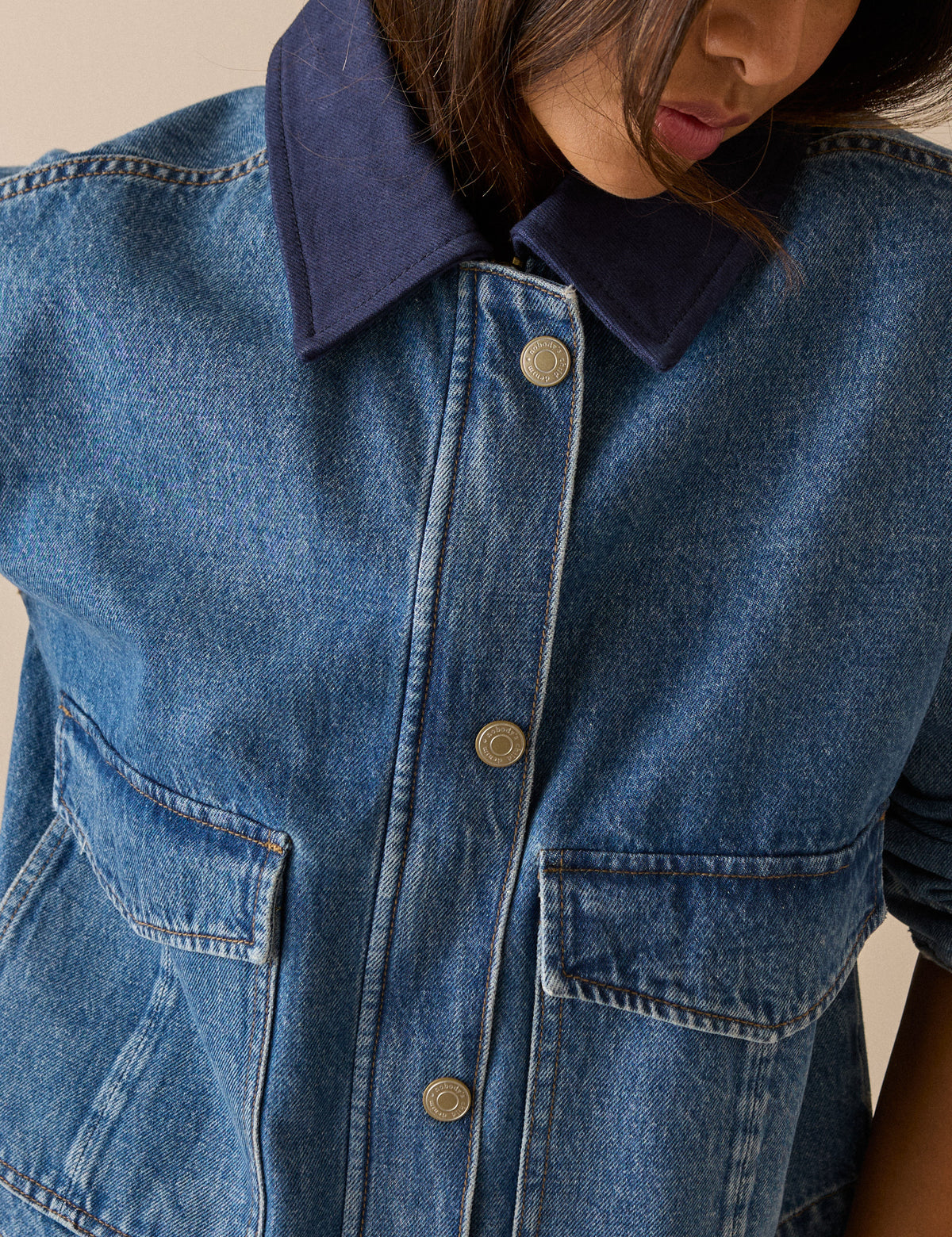 Contrast collar detail on mid blue denim jacket