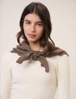 Brown crochet trim triangle scarf tied at neck