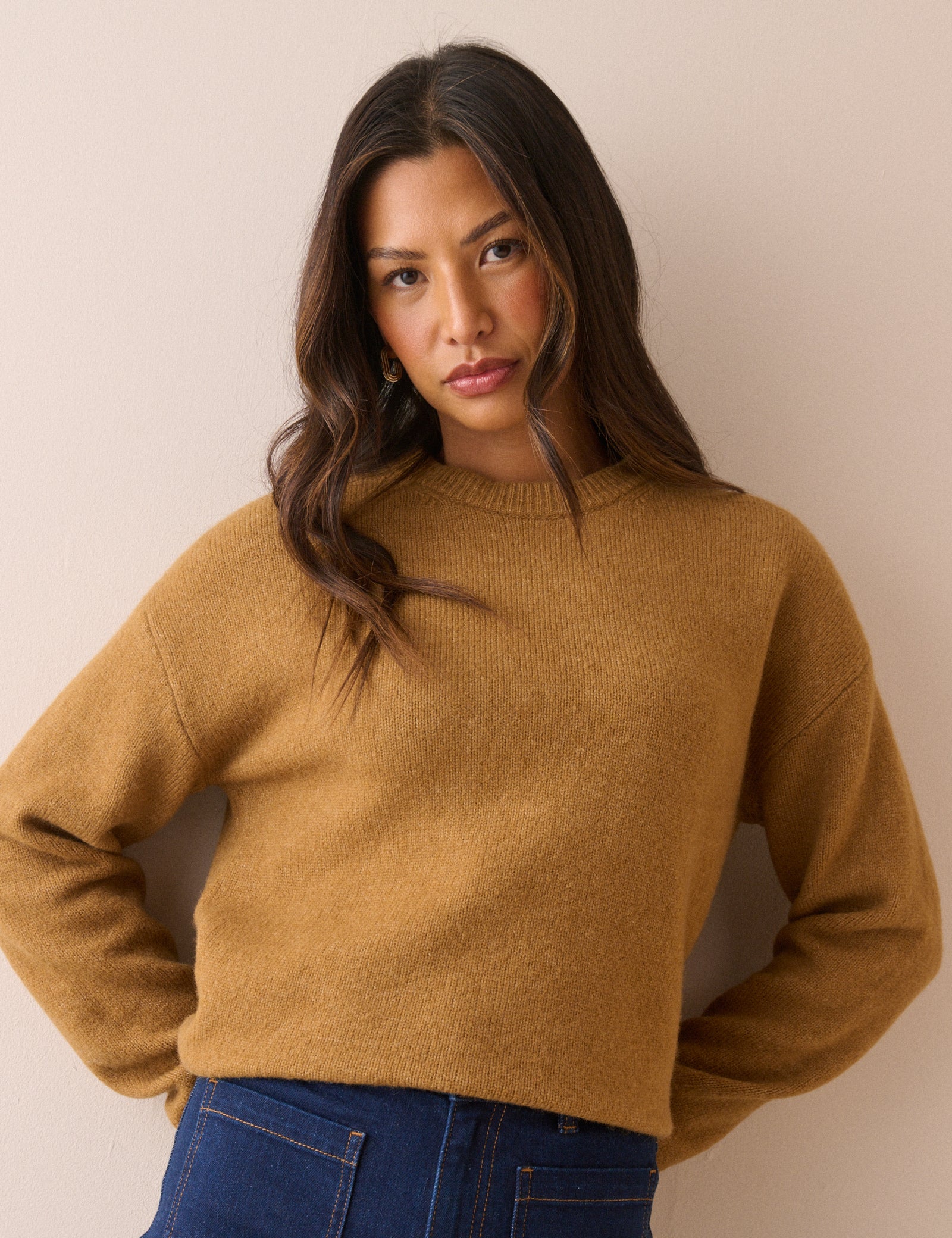 Front view of ochre crew neck jumper