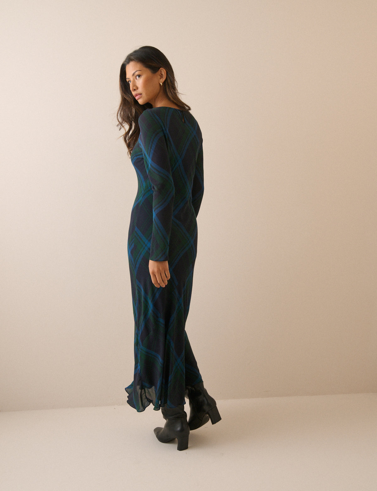 Back view of navy tartan midi dress with long sleeves