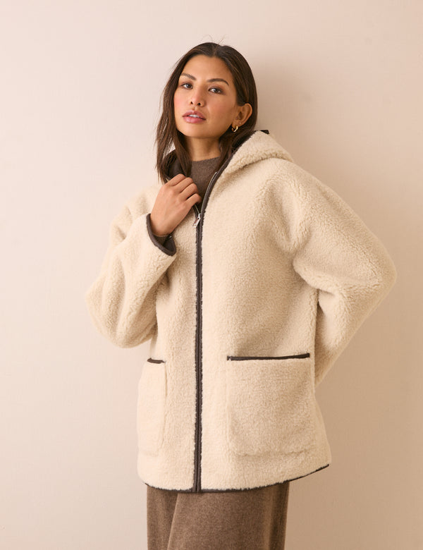 Cream faux shearling hooded jacket with brown trim
