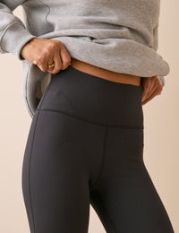 High waistband detail on black jersey leggings