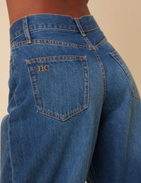 Blue High Rise Horseshoe Barrel Leg Jeans