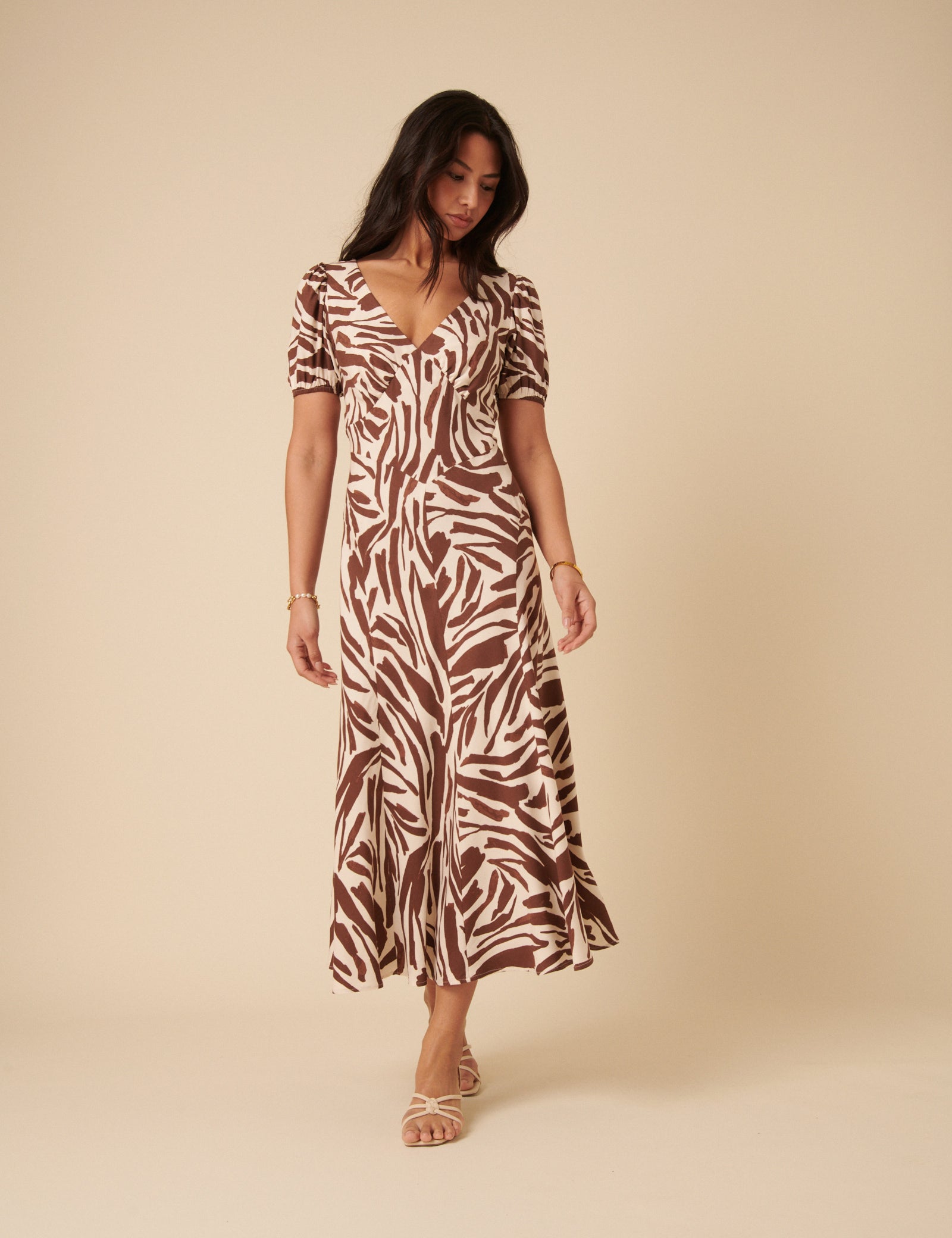 brown zebra dress Flare Sleeve Maxi style sleeves add a touch of drama Long Sleeve Maxi Dress In