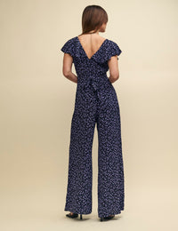 Purple Ditsy Floral Flutter Sleeve Suki Jumpsuit